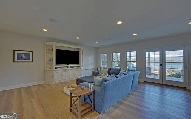 1951 Island View Dr, Hiawassee, GA 30546 - living area featuring light wood-style flooring, recessed lighting, french doors, and baseboards