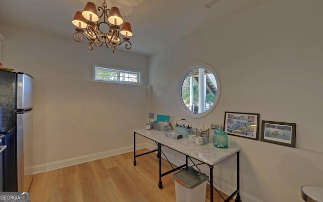 1951 Island View Dr, Hiawassee, GA 30546 - office with a chandelier, baseboards, and light wood-style flooring
