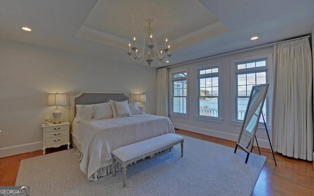1951 Island View Dr, Hiawassee, GA 30546 - bedroom featuring a chandelier, multiple windows, wood finished floors, crown molding, and recessed lighting