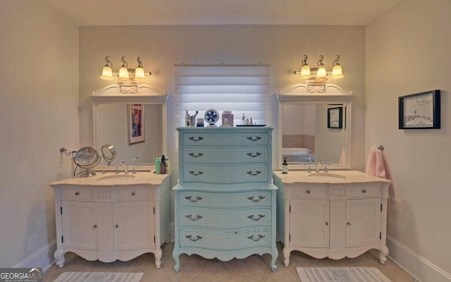 1951 Island View Dr, Hiawassee, GA 30546 - full bath with two vanities, tile patterned floors, and baseboards