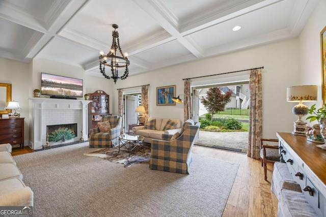555 Red Bluff Dr, Athens, GA 30607 - living room featuring wood finished floors, coffered ceiling, beamed ceiling, a brick fireplace, and a chandelier