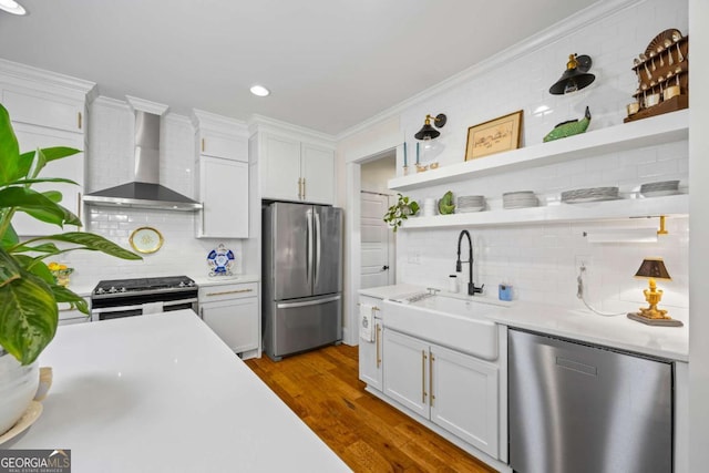 555 Red Bluff Dr, Athens, GA 30607 - kitchen with appliances with stainless steel finishes, wall chimney exhaust hood, open shelves, backsplash, and crown molding