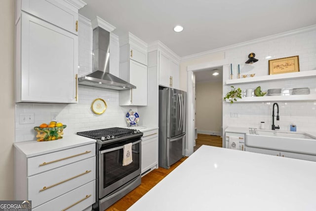 555 Red Bluff Dr, Athens, GA 30607 - kitchen featuring stainless steel appliances, wall chimney range hood, tasteful backsplash, open shelves, and crown molding