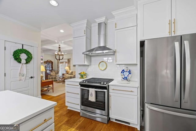 555 Red Bluff Dr, Athens, GA 30607 - kitchen with appliances with stainless steel finishes, wall chimney exhaust hood, ornamental molding, recessed lighting, and light countertops