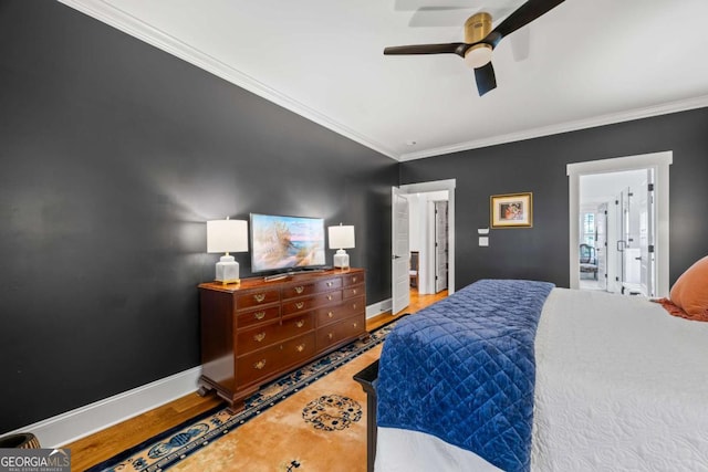 555 Red Bluff Dr, Athens, GA 30607 - bedroom featuring wood finished floors, ornamental molding, and a ceiling fan