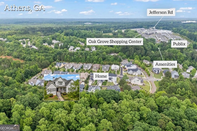 555 Red Bluff Dr, Athens, GA 30607 - aerial view of residential area with property parcel outlined and a forest