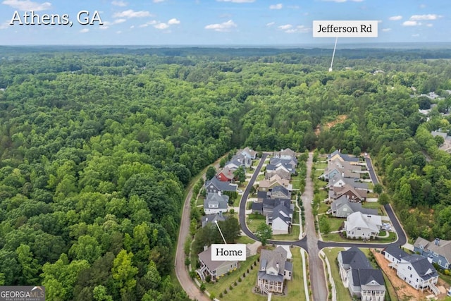 555 Red Bluff Dr, Athens, GA 30607 - aerial overview of property's location with a forest and nearby suburban area