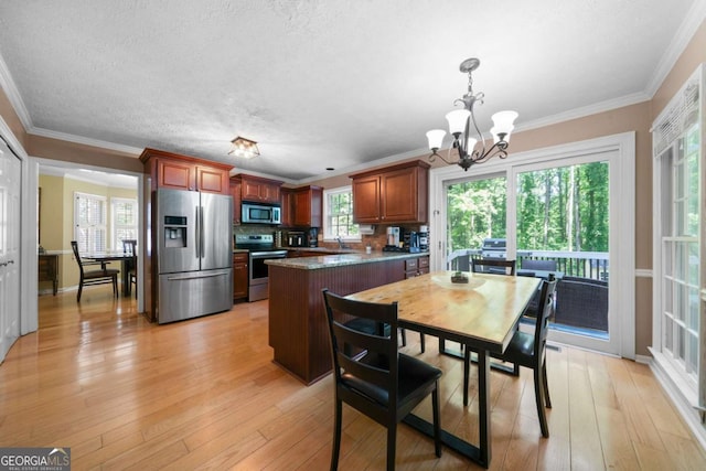 1769 Milford Creek Cts SW, Marietta, GA 30008 - dining area featuring a chandelier, light wood-type flooring, crown molding, and a textured ceiling