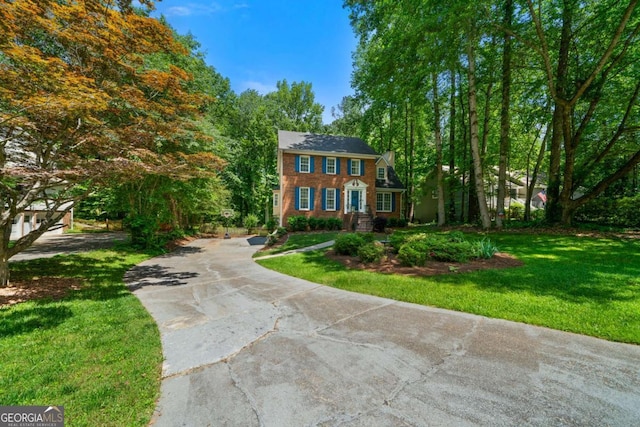 1769 Milford Creek Cts SW, Marietta, GA 30008 - colonial house with concrete driveway and a front yard