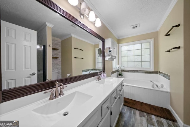 1769 Milford Creek Cts SW, Marietta, GA 30008 - full bath with a textured ceiling, wood finished floors, double vanity, a garden tub, and crown molding