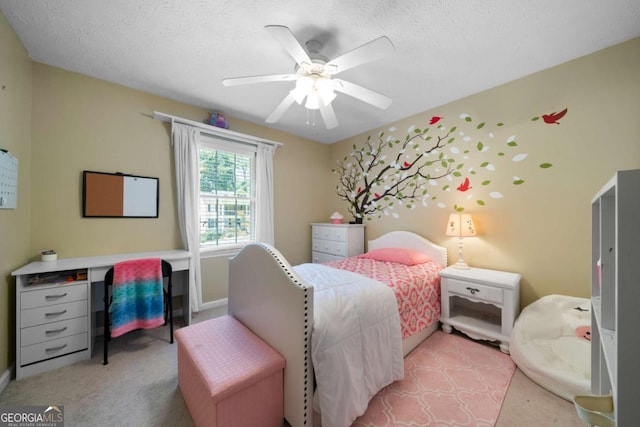 1769 Milford Creek Cts SW, Marietta, GA 30008 - bedroom featuring light colored carpet, a textured ceiling, and ceiling fan