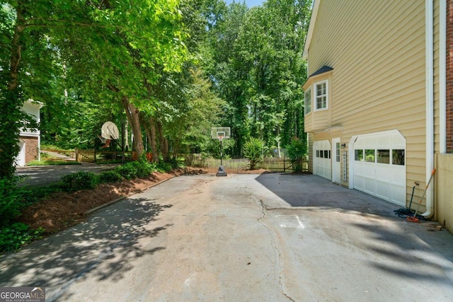 1769 Milford Creek Cts SW, Marietta, GA 30008 - view of patio / terrace with driveway and a garage