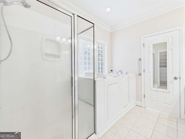 1090 Lane Creek Cir, Bishop, GA 30621 - full bath featuring crown molding, a shower stall, tile patterned flooring, a garden tub, and baseboards