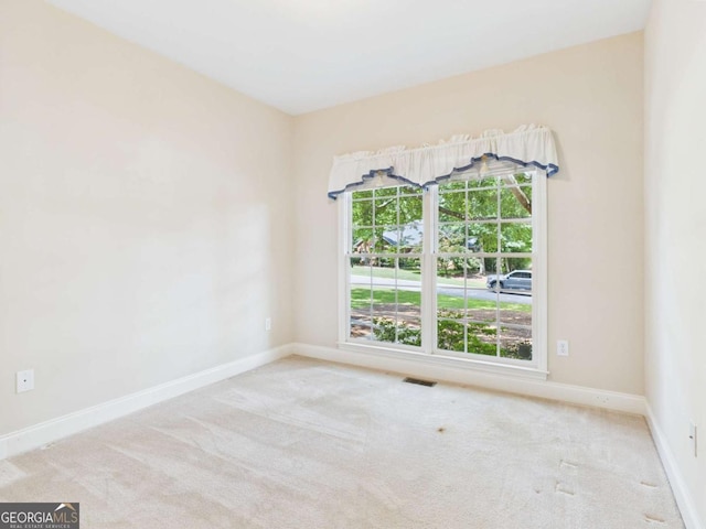1090 Lane Creek Cir, Bishop, GA 30621 - spare room featuring healthy amount of natural light, carpet flooring, and baseboards