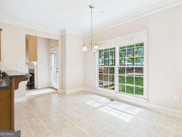 1090 Lane Creek Cir, Bishop, GA 30621 - unfurnished dining area with crown molding, a chandelier, a fireplace, baseboards, and light tile patterned floors