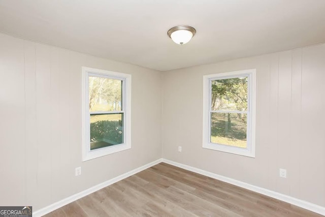 272 Old Sudie Rd, Hiram, GA 30141 - spare room with plenty of natural light and wood finished floors