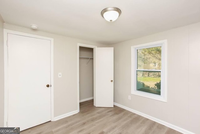 272 Old Sudie Rd, Hiram, GA 30141 - unfurnished bedroom with light wood finished floors and a closet