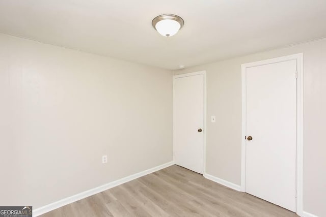 272 Old Sudie Rd, Hiram, GA 30141 - unfurnished bedroom featuring light wood finished floors and baseboards