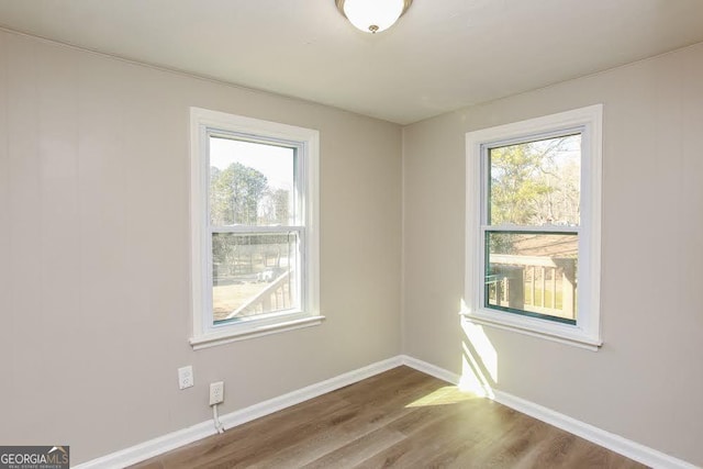 272 Old Sudie Rd, Hiram, GA 30141 - empty room featuring healthy amount of natural light and wood finished floors