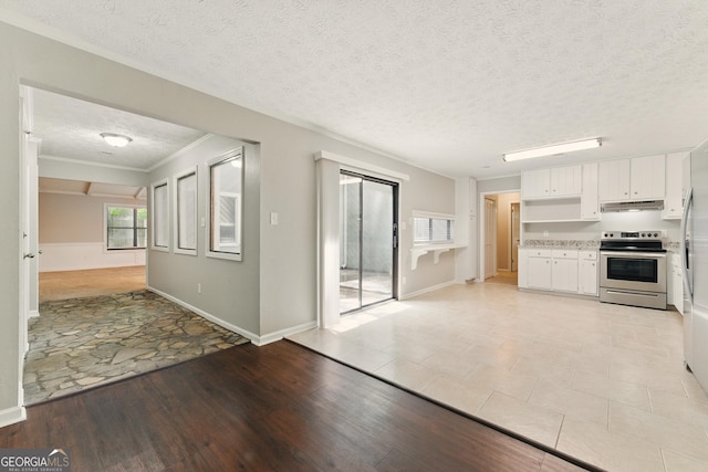 2041 Kramer Way, Marietta, GA 30062 - kitchen with appliances with stainless steel finishes, under cabinet range hood, white cabinetry, light countertops, and a textured ceiling