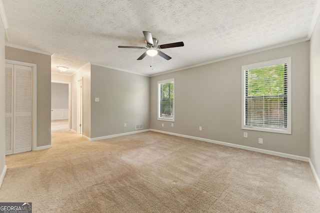 2041 Kramer Way, Marietta, GA 30062 - unfurnished room with ornamental molding, a ceiling fan, light carpet, baseboards, and a textured ceiling