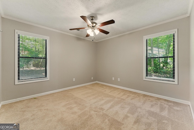 2041 Kramer Way, Marietta, GA 30062 - spare room featuring healthy amount of natural light, ornamental molding, a ceiling fan, carpet flooring, and a textured ceiling