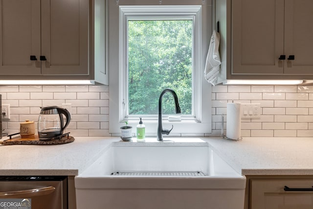 724 Bertha Willis Rd, Carlton, GA 30627 - kitchen featuring a sink, dishwasher, tasteful backsplash, and light stone counters