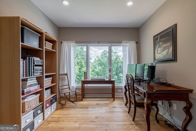 724 Bertha Willis Rd, Carlton, GA 30627 - home office with light wood finished floors and recessed lighting
