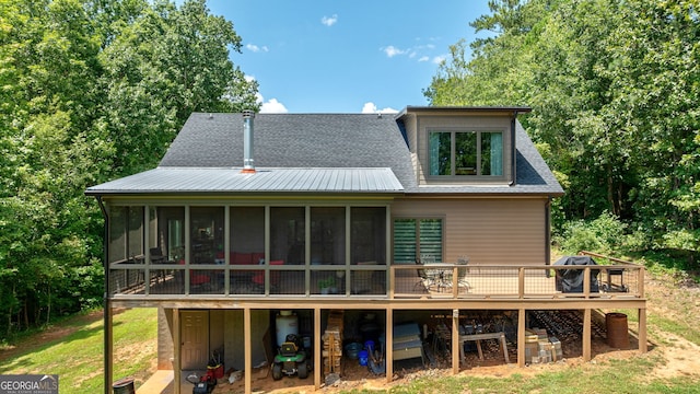 724 Bertha Willis Rd, Carlton, GA 30627 - back of house with a sunroom, a deck, and roof with shingles