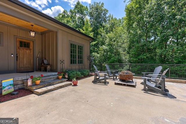 724 Bertha Willis Rd, Carlton, GA 30627 - view of patio with an outdoor fire pit