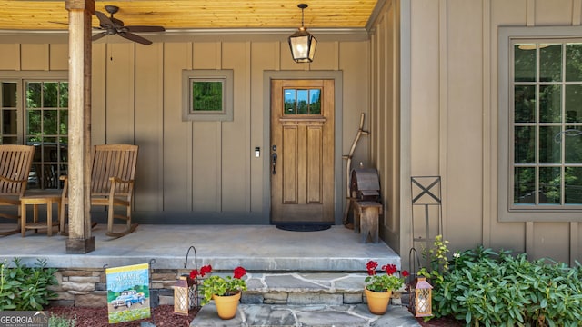 724 Bertha Willis Rd, Carlton, GA 30627 - doorway to property featuring board and batten siding and a ceiling fan