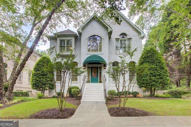 42 Greenland Trce, Atlanta, GA 30342 - view of front of property featuring a front yard and stucco siding