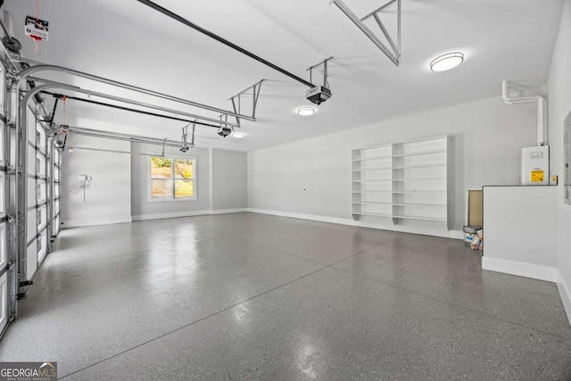 407 Thunder Rd, Buford, GA 30518 - garage with a garage door opener and baseboards