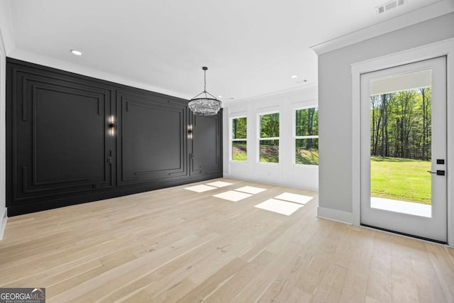 407 Thunder Rd, Buford, GA 30518 - unfurnished dining area featuring light wood-style floors, recessed lighting, and a chandelier