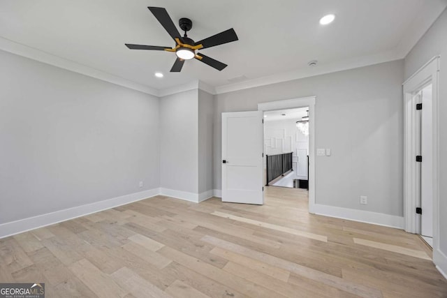 407 Thunder Rd, Buford, GA 30518 - unfurnished bedroom with crown molding, light wood-style flooring, recessed lighting, connected bathroom, and ceiling fan