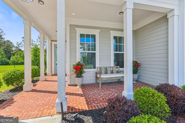229 Widener Way, Peachtree City, GA 30269 - doorway to property with covered porch