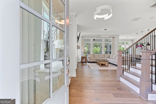 229 Widener Way, Peachtree City, GA 30269 - entryway with french doors, wood finished floors, and stairway