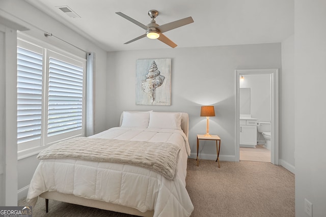 229 Widener Way, Peachtree City, GA 30269 - bedroom featuring carpet flooring, baseboards, ensuite bathroom, and multiple windows