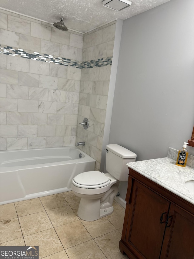 4191 Alaina Cir, Austell, GA 30106 - bathroom with vanity, tile patterned flooring, a textured ceiling, a combined bath / shower with rainfall shower, and toilet