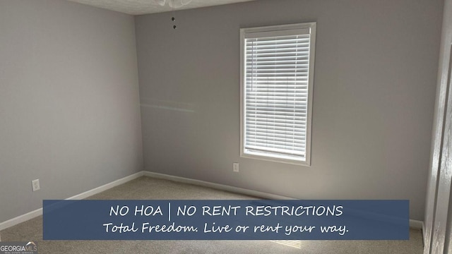 4191 Alaina Cir, Austell, GA 30106 - carpeted empty room with baseboards and a ceiling fan