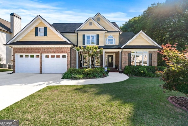 2978 Legislative Ln, Buford, GA 30519 - view of front of home featuring brick siding, concrete driveway, a front yard, central air condition unit, and an attached garage