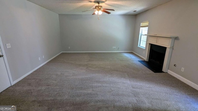 3881 Micah Ln, Ellenwood, GA 30294 - unfurnished living room with ceiling fan, a textured ceiling, carpet floors, and baseboards