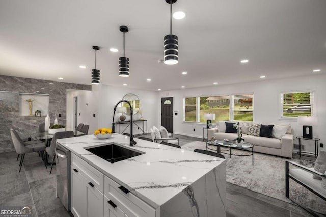 681 Fielding Ln SW, Atlanta, GA 30311 - kitchen featuring open floor plan, dishwasher, recessed lighting, white cabinets, and decorative light fixtures