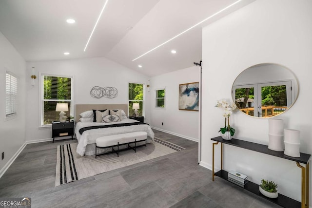 681 Fielding Ln SW, Atlanta, GA 30311 - bedroom with lofted ceiling, recessed lighting, wood finished floors, and a barn door