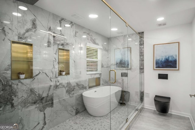 681 Fielding Ln SW, Atlanta, GA 30311 - bathroom featuring a soaking tub, a marble finish shower, radiator heating unit, and recessed lighting