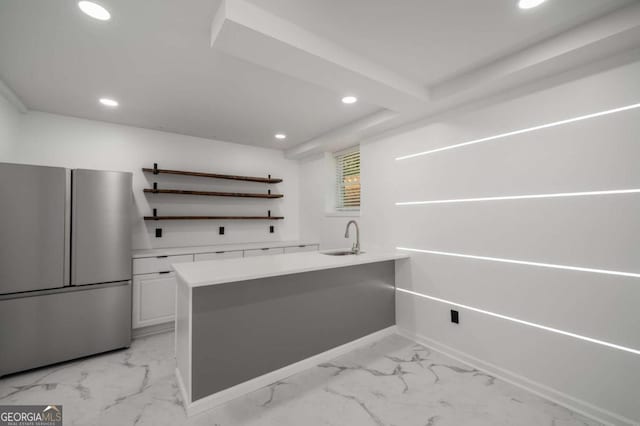 681 Fielding Ln SW, Atlanta, GA 30311 - laundry room with light marble finish floors, recessed lighting, and wet bar