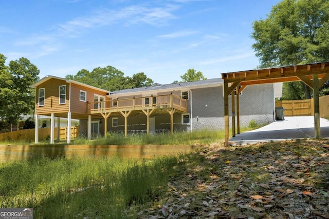 681 Fielding Ln SW, Atlanta, GA 30311 - rear view of property featuring a deck and brick siding