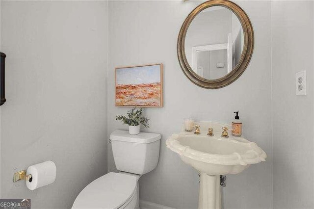 1050 Shady Valley Pl, Atlanta, GA 30324 - bathroom featuring toilet