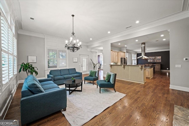 1323 Frey Lake Ct NW, Kennesaw, GA 30144 - living area with a chandelier, ornamental molding, dark wood-type flooring, recessed lighting, and baseboards