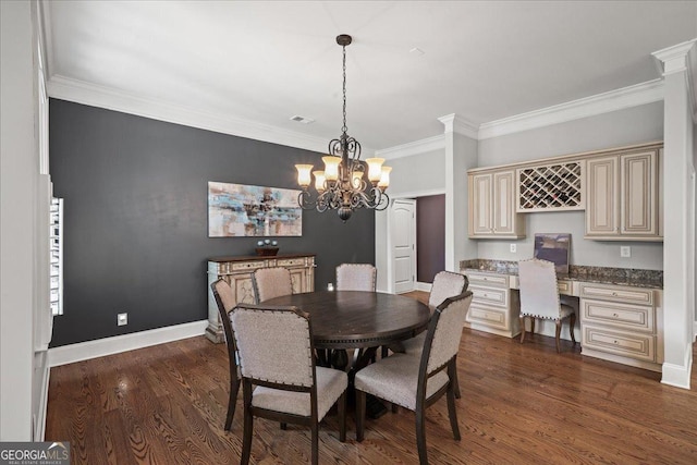 1323 Frey Lake Ct NW, Kennesaw, GA 30144 - dining space featuring ornamental molding, dark wood-type flooring, a chandelier, and baseboards